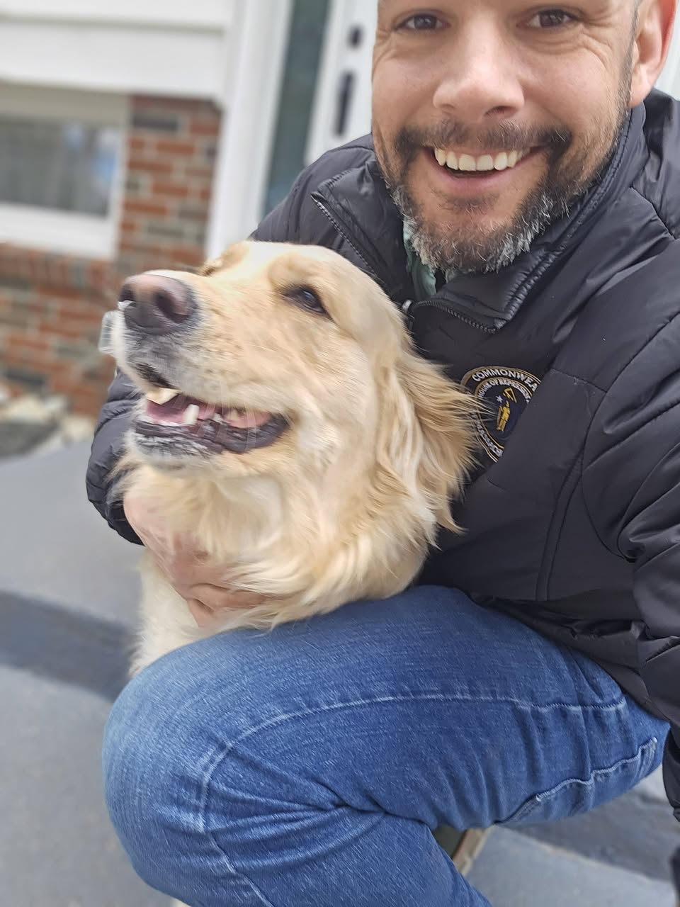 Joe McKenna with a golden retriever